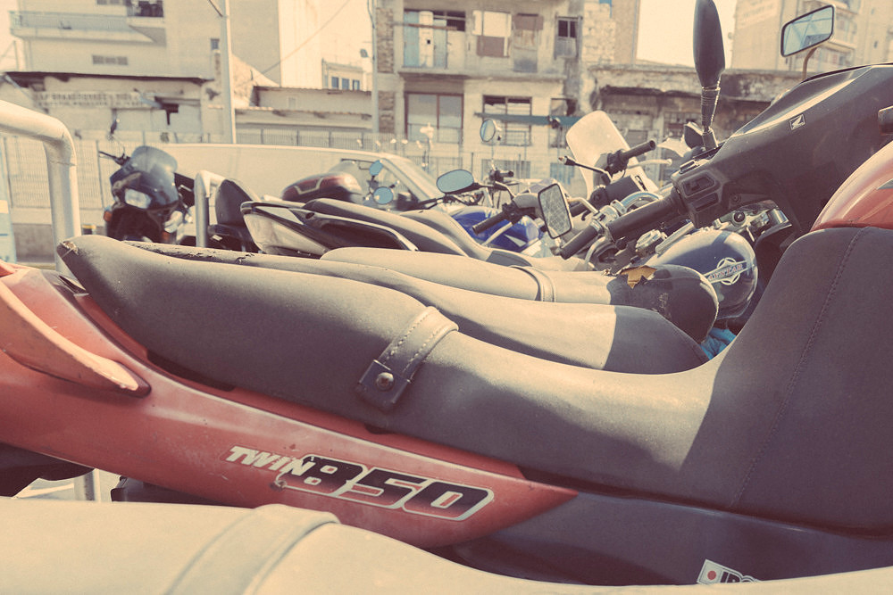 "bike shop", Pireas, "reluctant model", colours,  "nescafé cans", tools, "motor bikes"