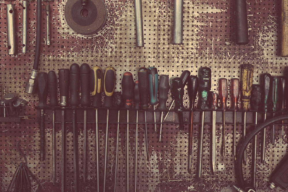 "bike shop", Pireas, "reluctant model", colours,  "nescafé cans", tools, "motor bikes"