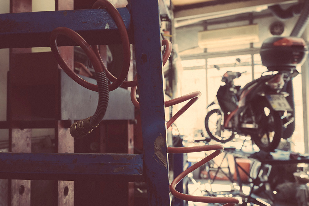 "bike shop", Pireas, "reluctant model", colours,  "nescafé cans", tools, "motor bikes"