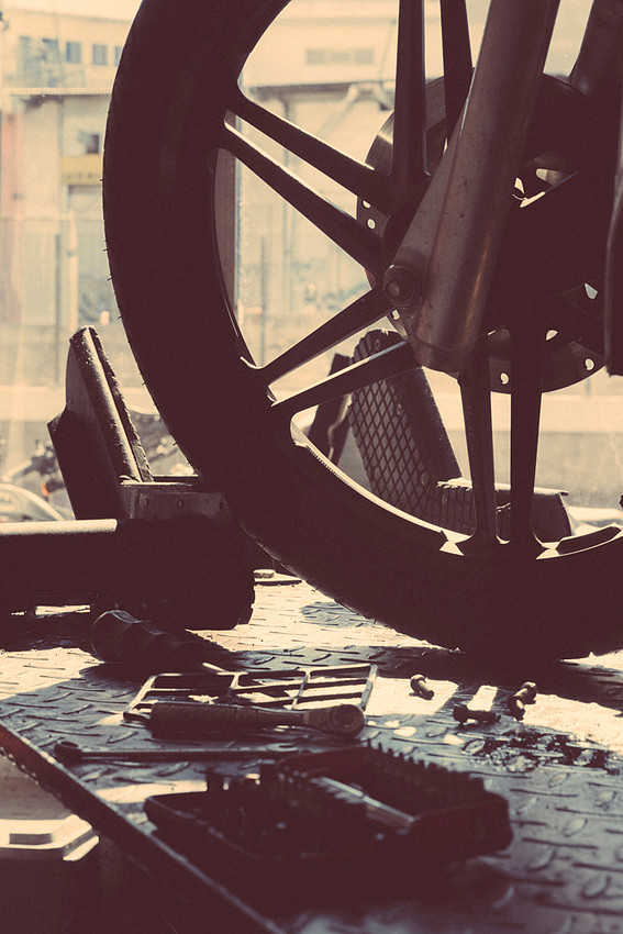 "bike shop", Pireas, "reluctant model", colours,  "nescafé cans", tools, "motor bikes"