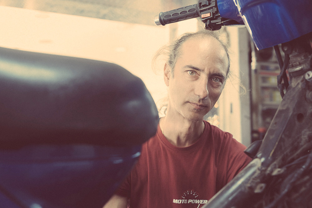 "bike shop", Pireas, "reluctant model", colours,  "nescafé cans", tools, "motor bikes"