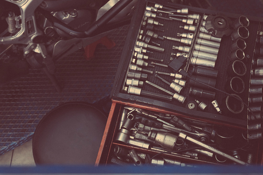"bike shop", Pireas, "reluctant model", colours,  "nescafé cans", tools, "motor bikes"