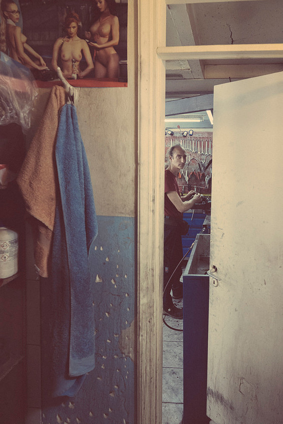 "bike shop", Pireas, "reluctant model", colours,  "nescafé cans", tools, "motor bikes"